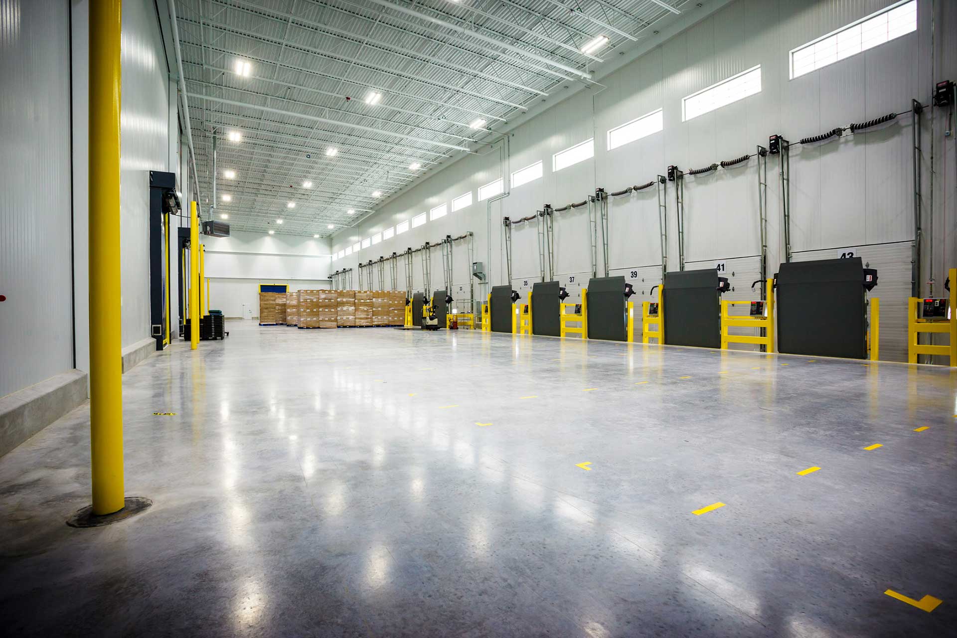 Interior view of truck docks at Golden State Foods distribution facility