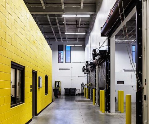 Interior view of the truck docks at the University of Chicago Facilities Services Building