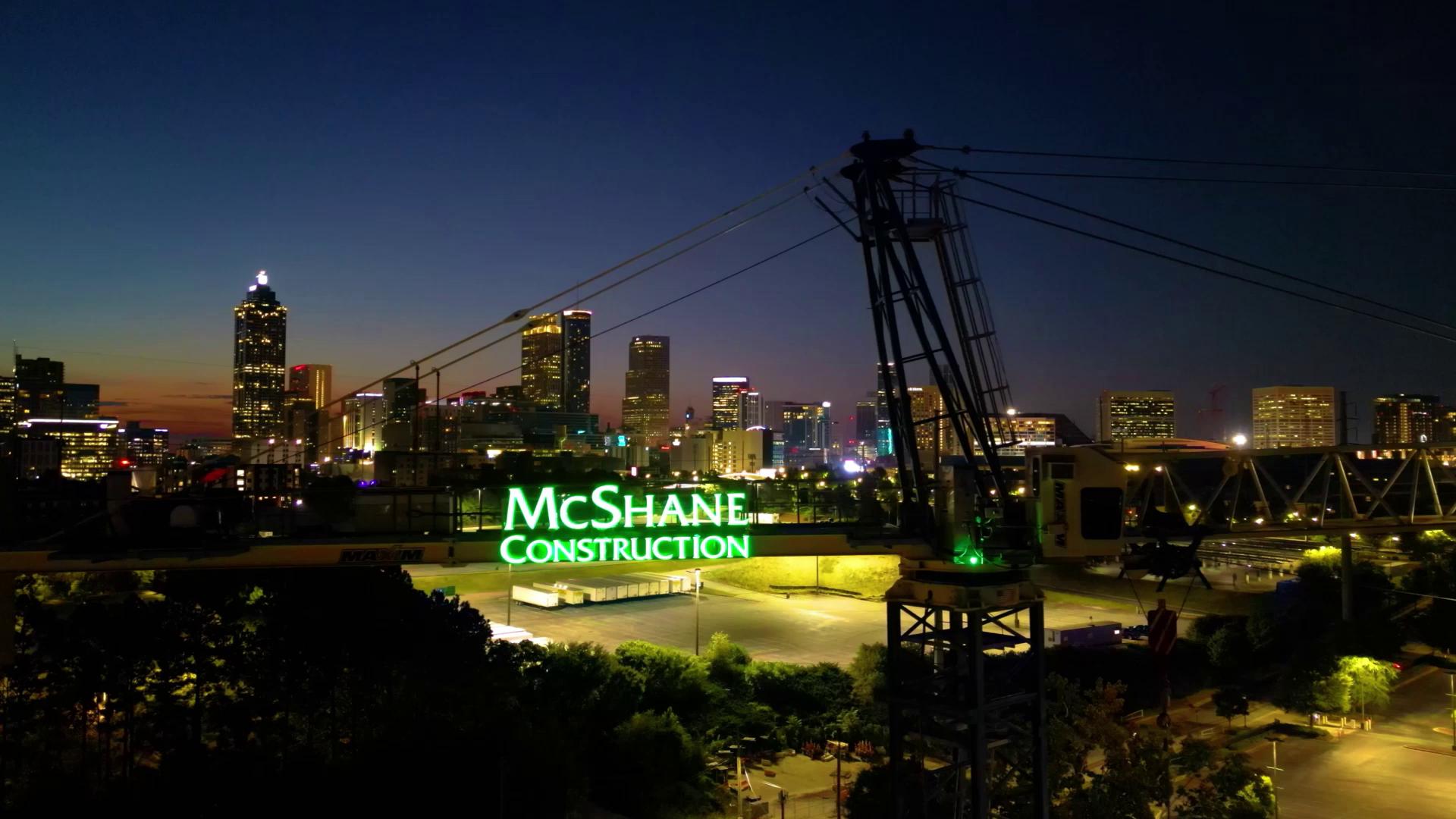 Image of skyline with McShane Construction logo
